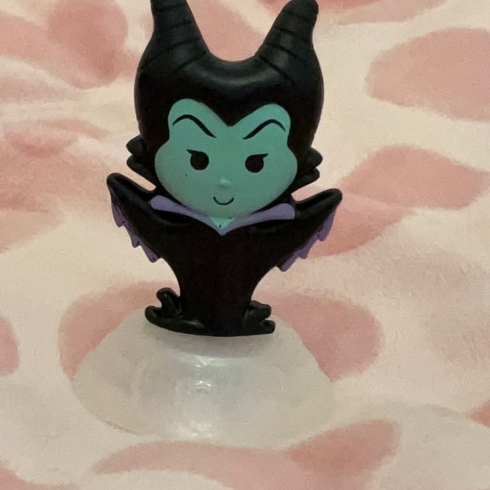 A maleficent small figure